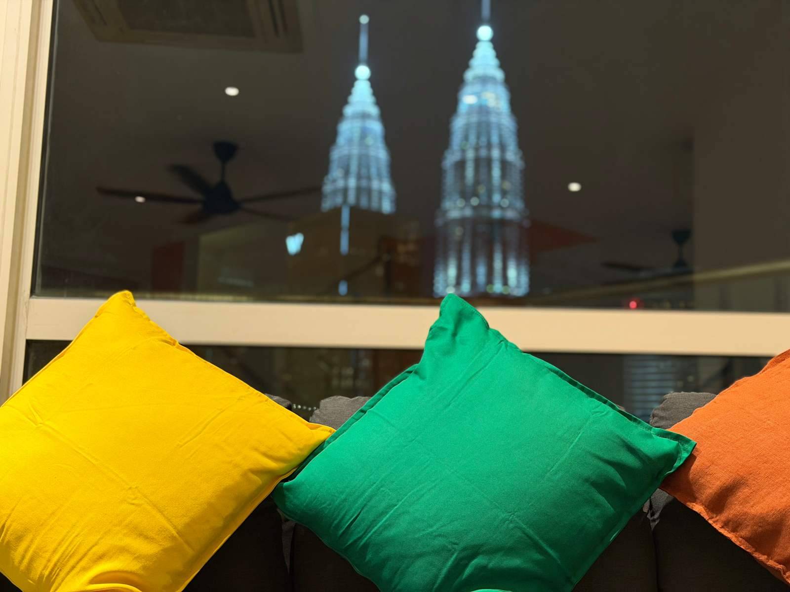 Common area cushions and KL skyline from Poshpack Skyline Hostel