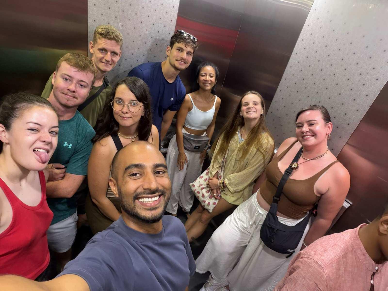 Guests in Crest Residence elevator at Poshpack Skyline Hostel